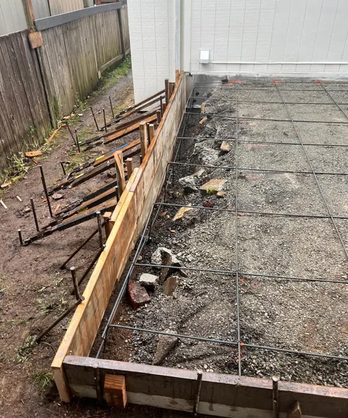 Broom finish patio and decorative borders in Covington 